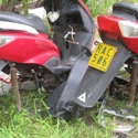 On Aitutaki, Cook Islands, abandoned motorbikes disintegrate.
