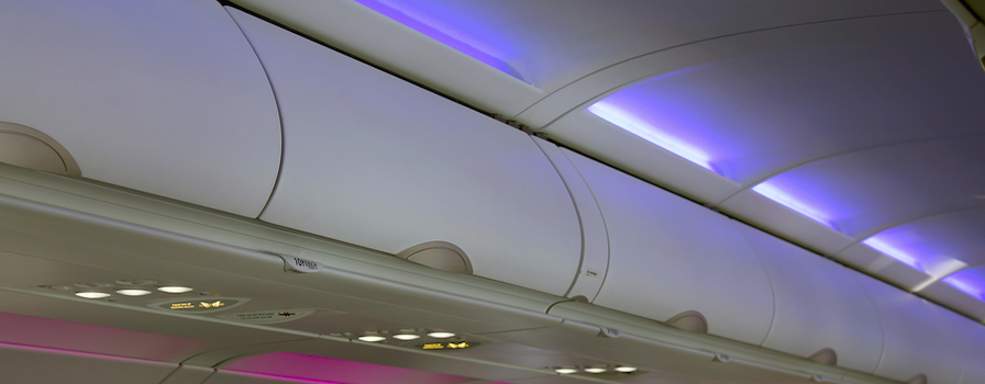 Overhead bin of modern airplane.