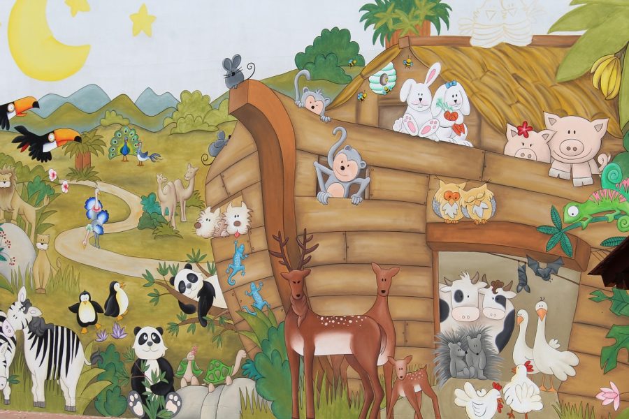 Happy animals crowding onto Noah's Ark.